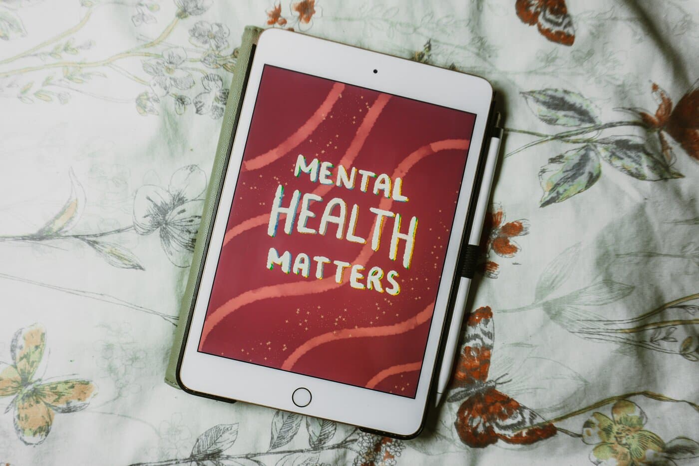 Therapy notes and planning materials on a desk, suggesting structured care.